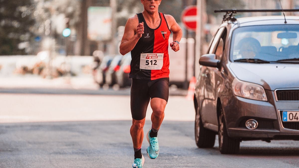 Athlete participating in a city marathon, showcasing endurance and focus.